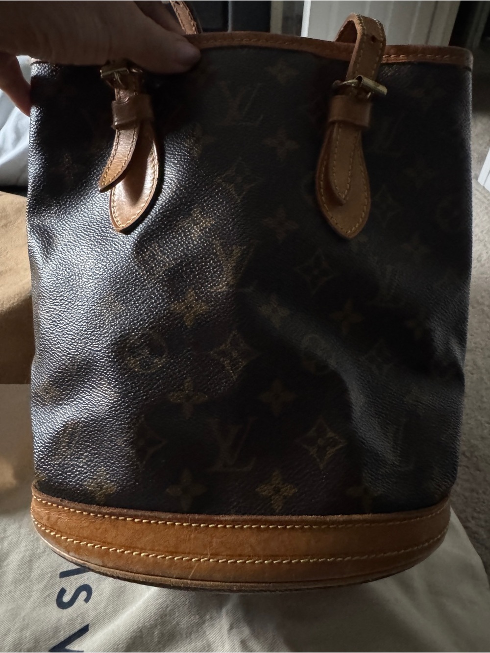 Louis Vuitton Monogram Canvas petite Bucket bag Tan. Inner liner replaced by LV